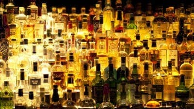 Shelves holding drinks bottles