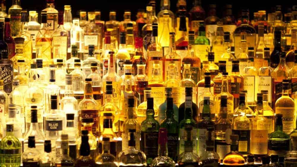 Shelves holding drinks bottles