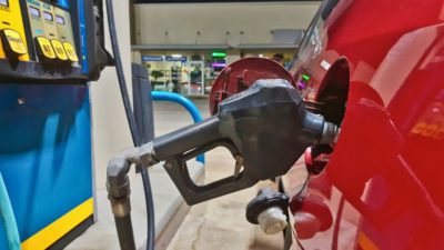 Filling up at the gas pumps.