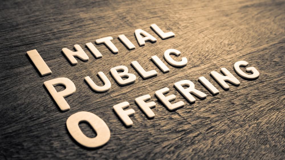 IPO abbreviation of Initial Public Offering text by wood letters