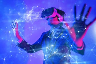 A gamer uses goggles to play an augmented reality game. tech