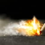 Striking match creates fire and light.